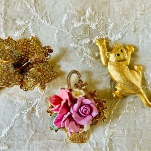 Gold-toned 3 piece Brooch Set with Floral and Cat Designs.